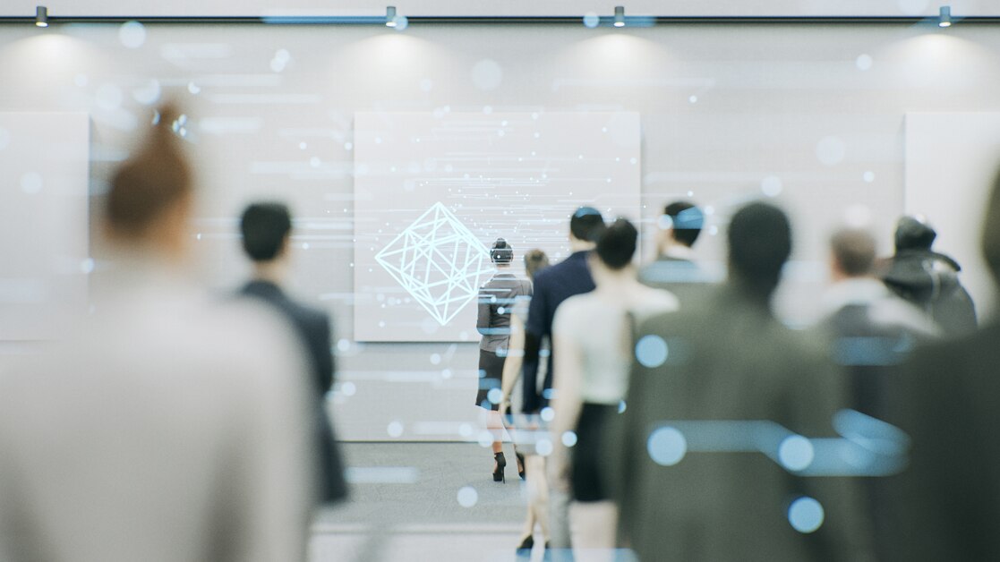 People watching an interactive technology presentation